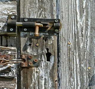Rotting and Rusty shed door.